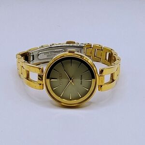 Women's Citizen Eco Drive Axiom Champagne Dial Gold Tone Watch EM0638-50P